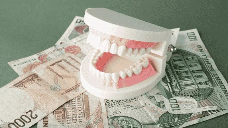 dental implants vs dentures cost comparison